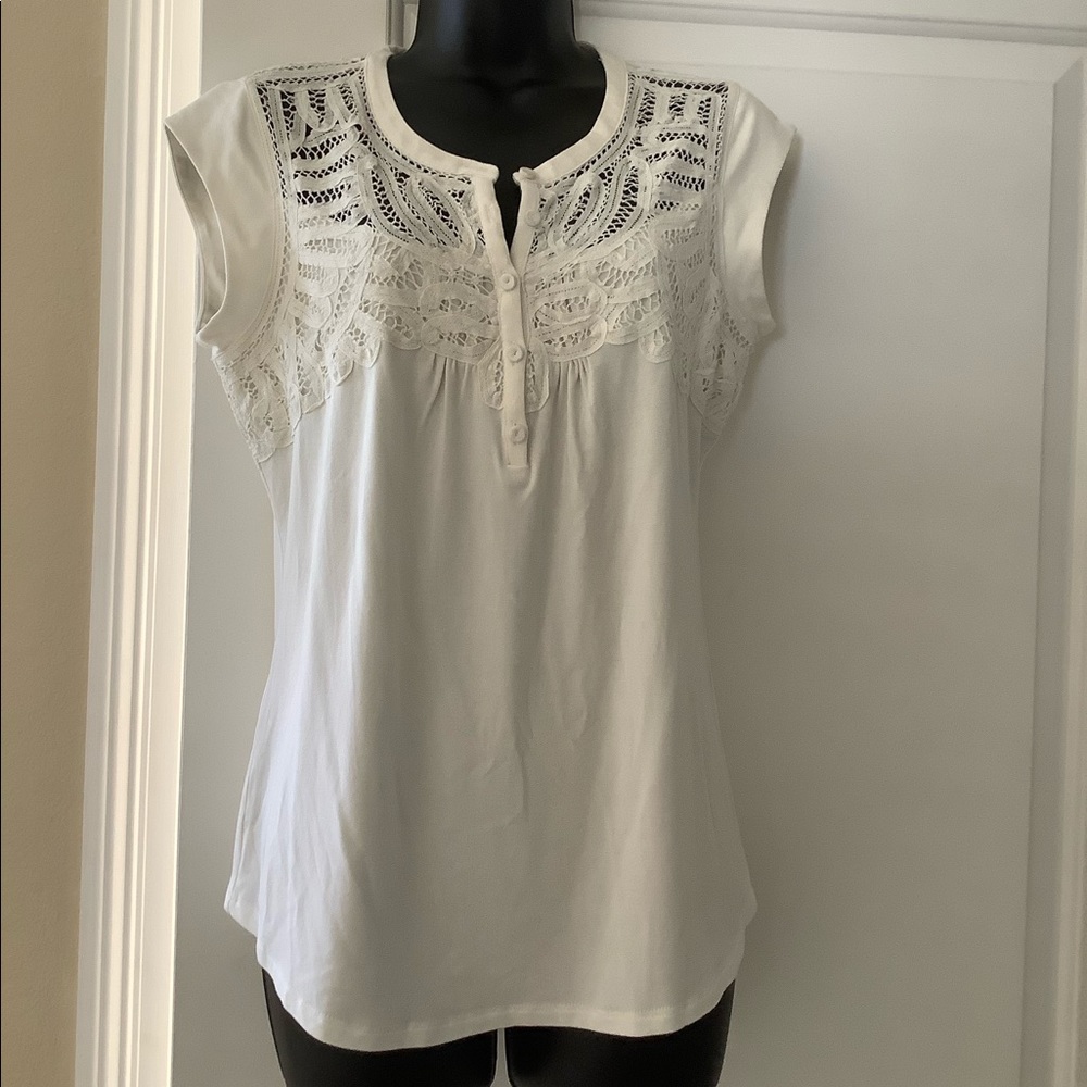 Cream colored sleeveless top